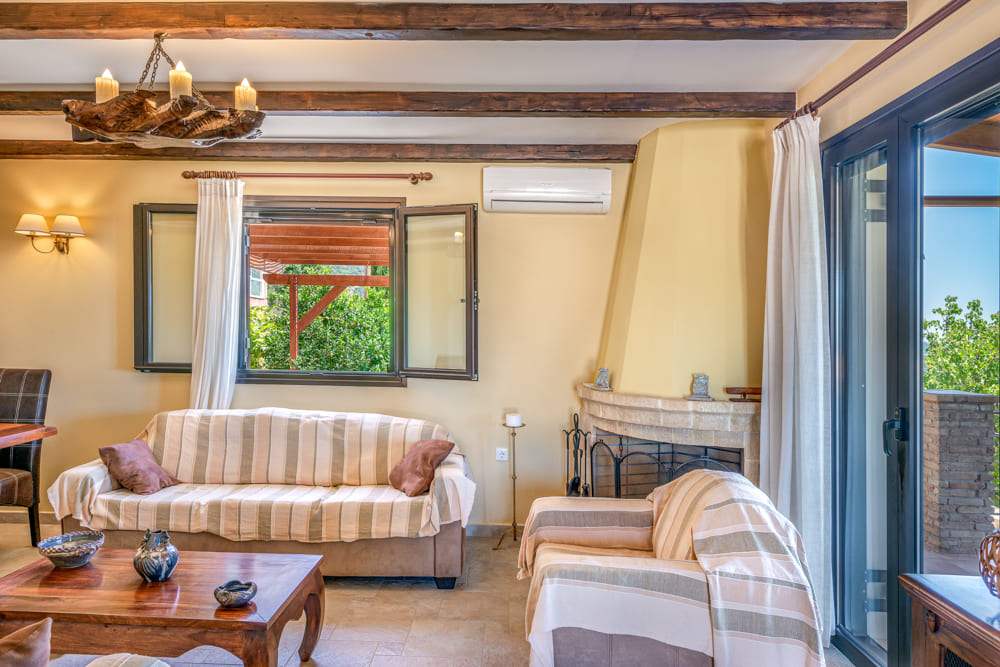Living room with fireplace of Villa Harmony